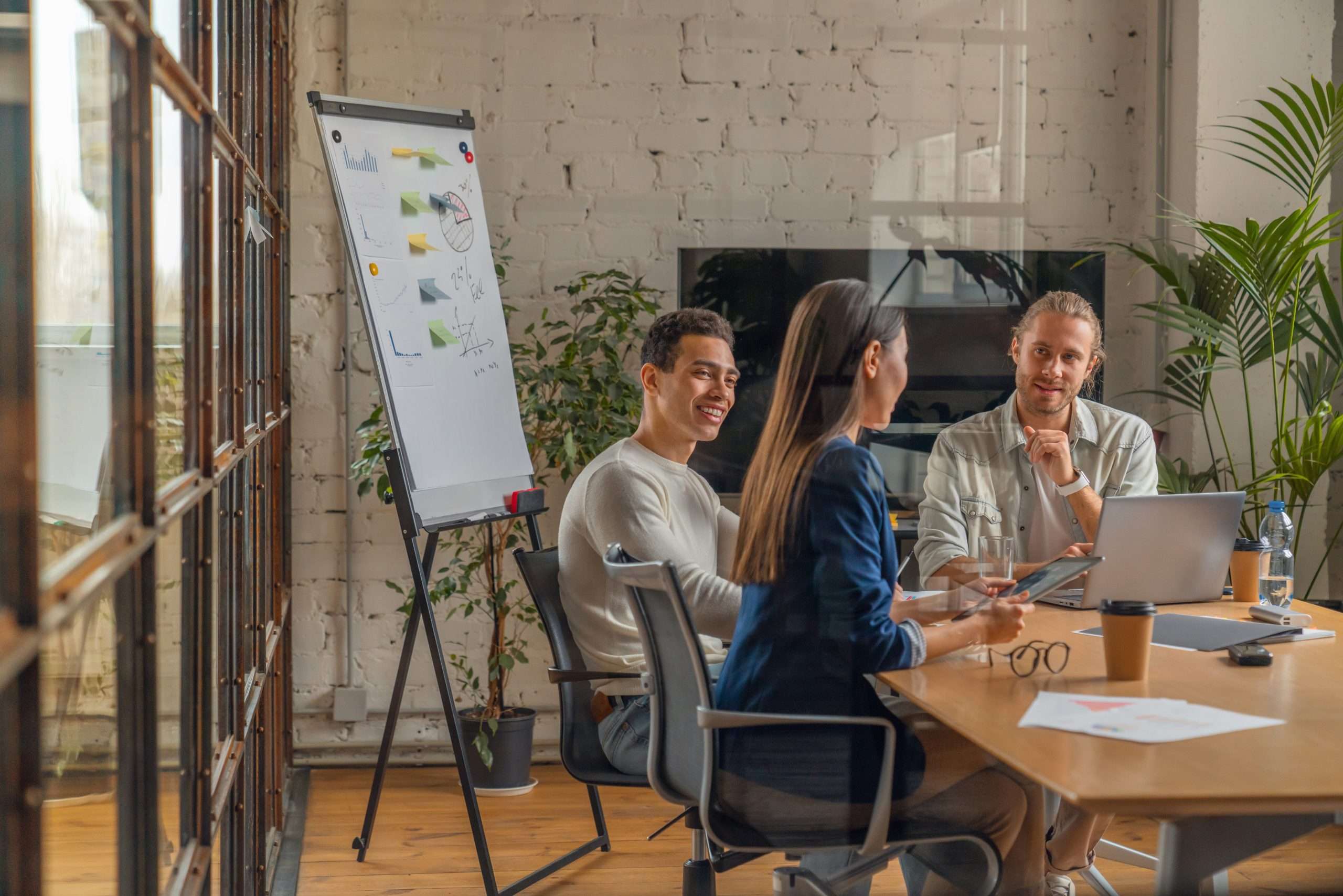 Business team discussing a website project in a meeting room