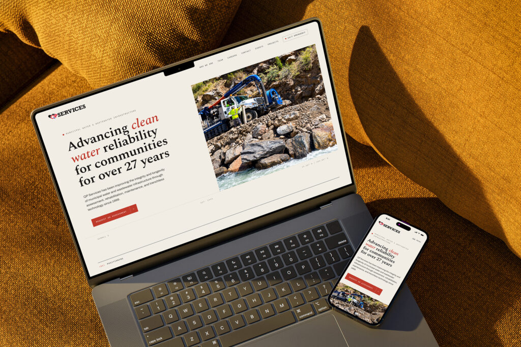 QP Services contractor website on a laptop and phone, homepage for a Colorado water and wastewater infrastructure company
